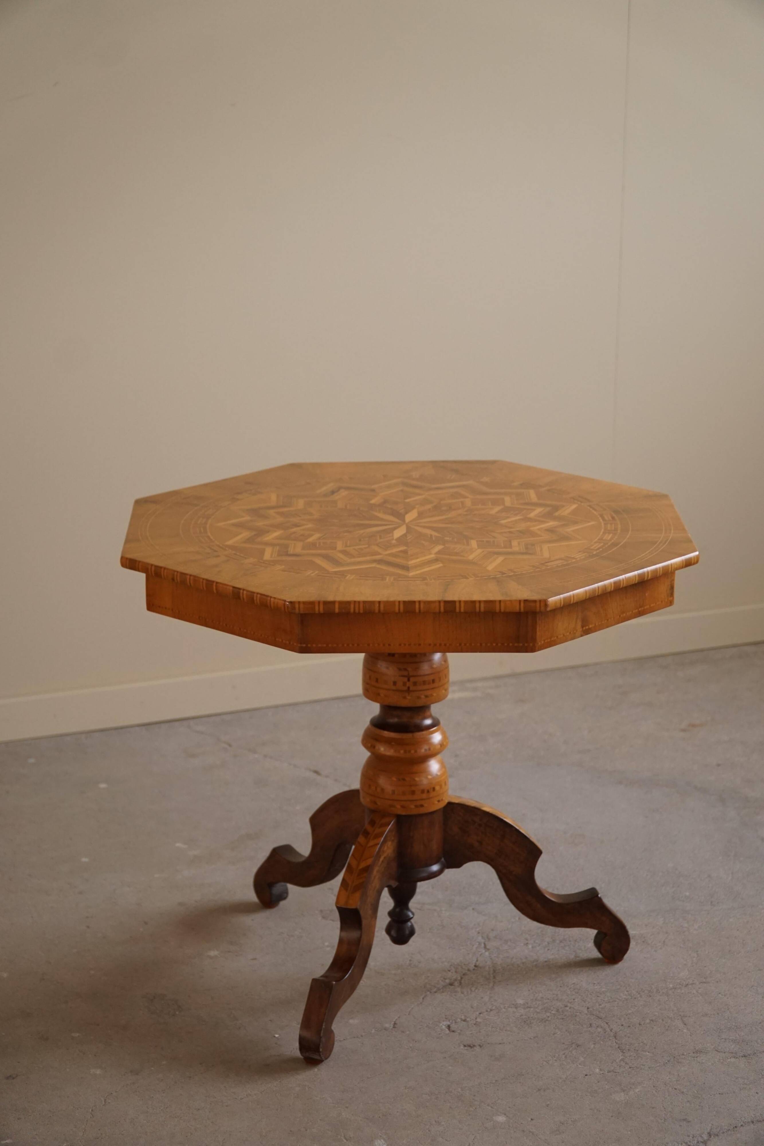 Danish Art Deco octagonal side table in birch with an inlaid top, 1940s.