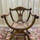 Fauteuil curule , assise cannée