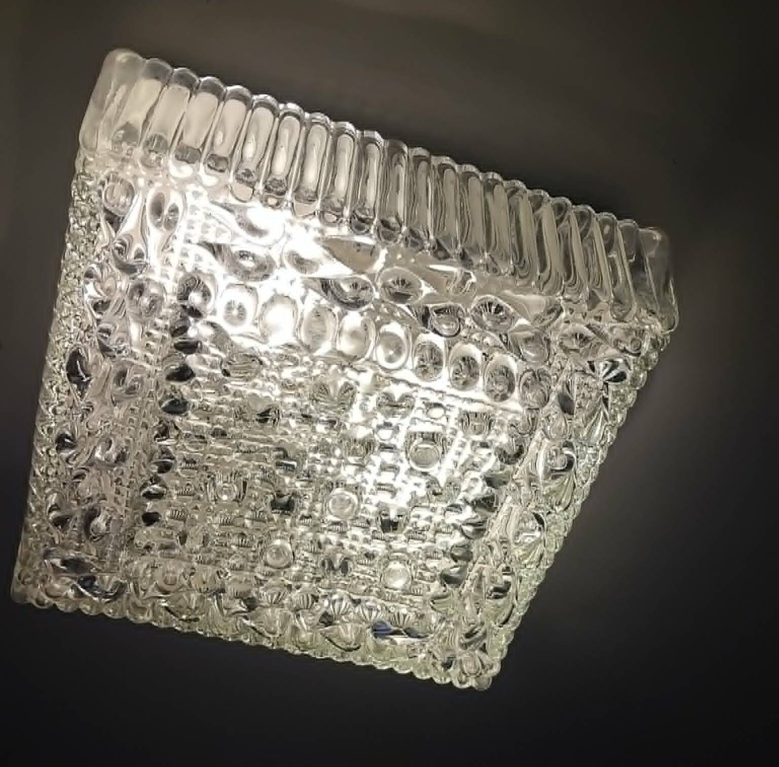 Square ceiling light made of moulded glass from the 1970s.