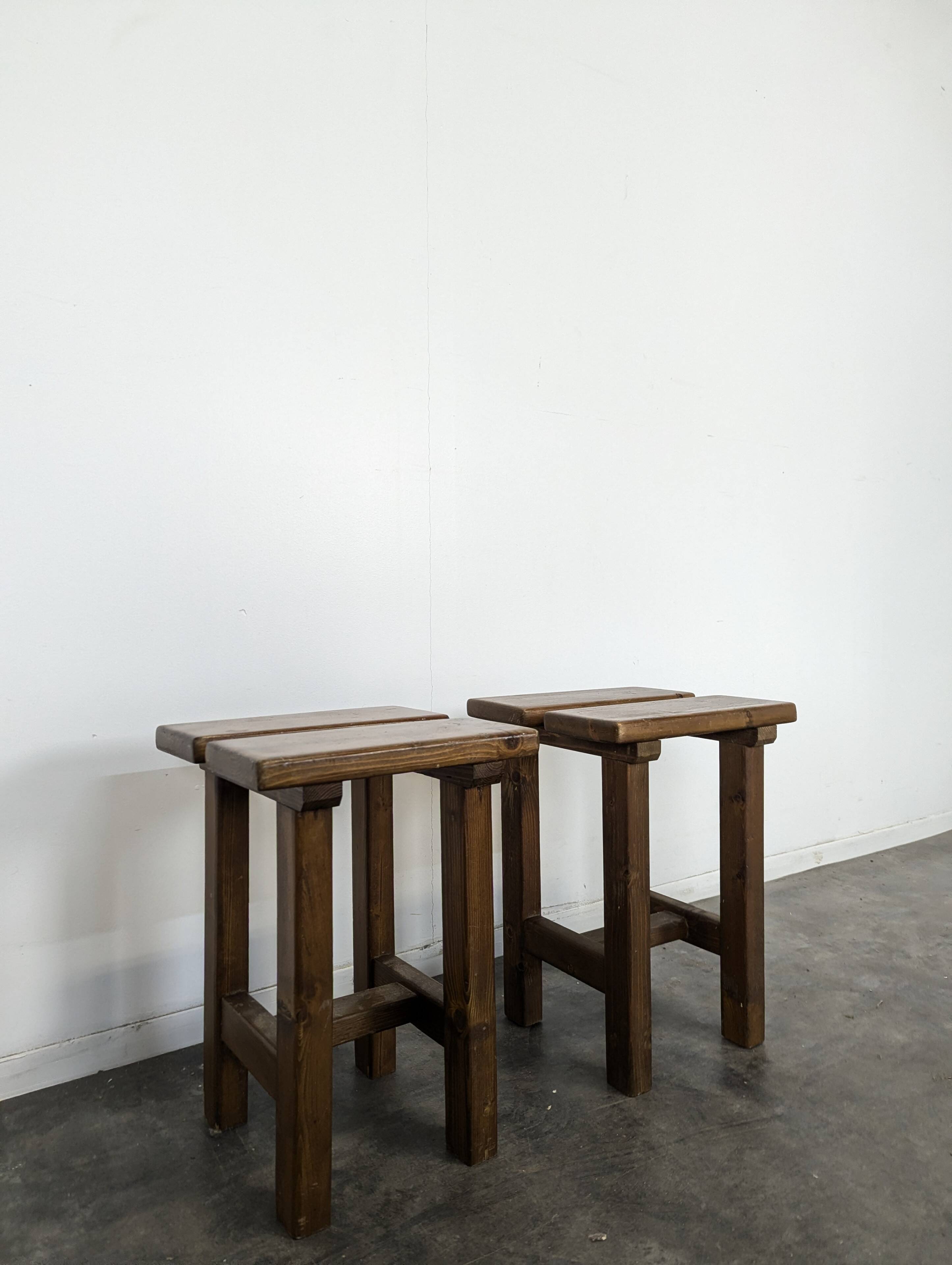 Pair of solid pine stools in the style of Charlotte Perriand.