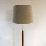 Mid-century floor lamp in teak and brass by Falkenbergs Belysning, Sweden, 1960s.