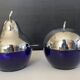 A pair of vintage cobalt glass and silver-plated sugar bowls.