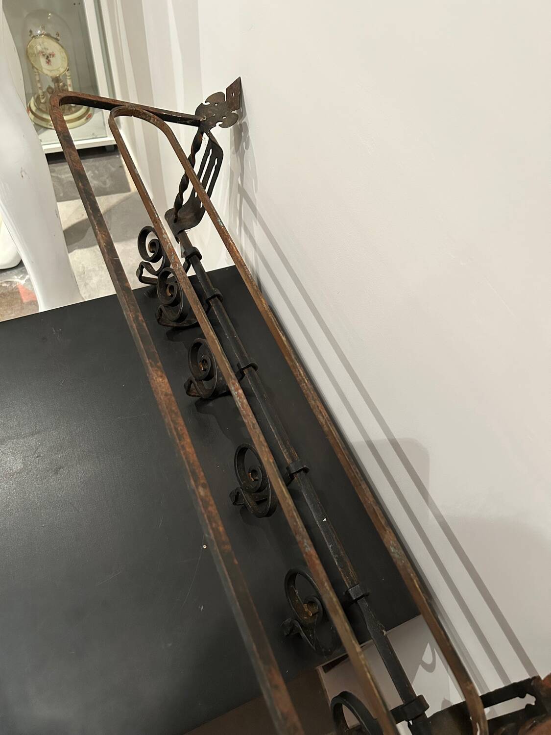 Large antique wall coat rack in wrought iron
