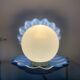 Lampe coquillage en céramique bleue