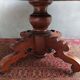 English oval table with 19th century mahogany extensions
