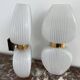 Pair of vintage wall lights from the 60s-70s in striped opaline glass and gilded brass.