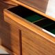 Vintage zebrano and walnut furniture from Morris of Glasgow.
