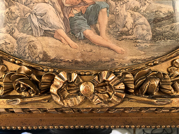 Louis XVI style trumeau in wood and gilded stucco and medallion engraving in the upper part