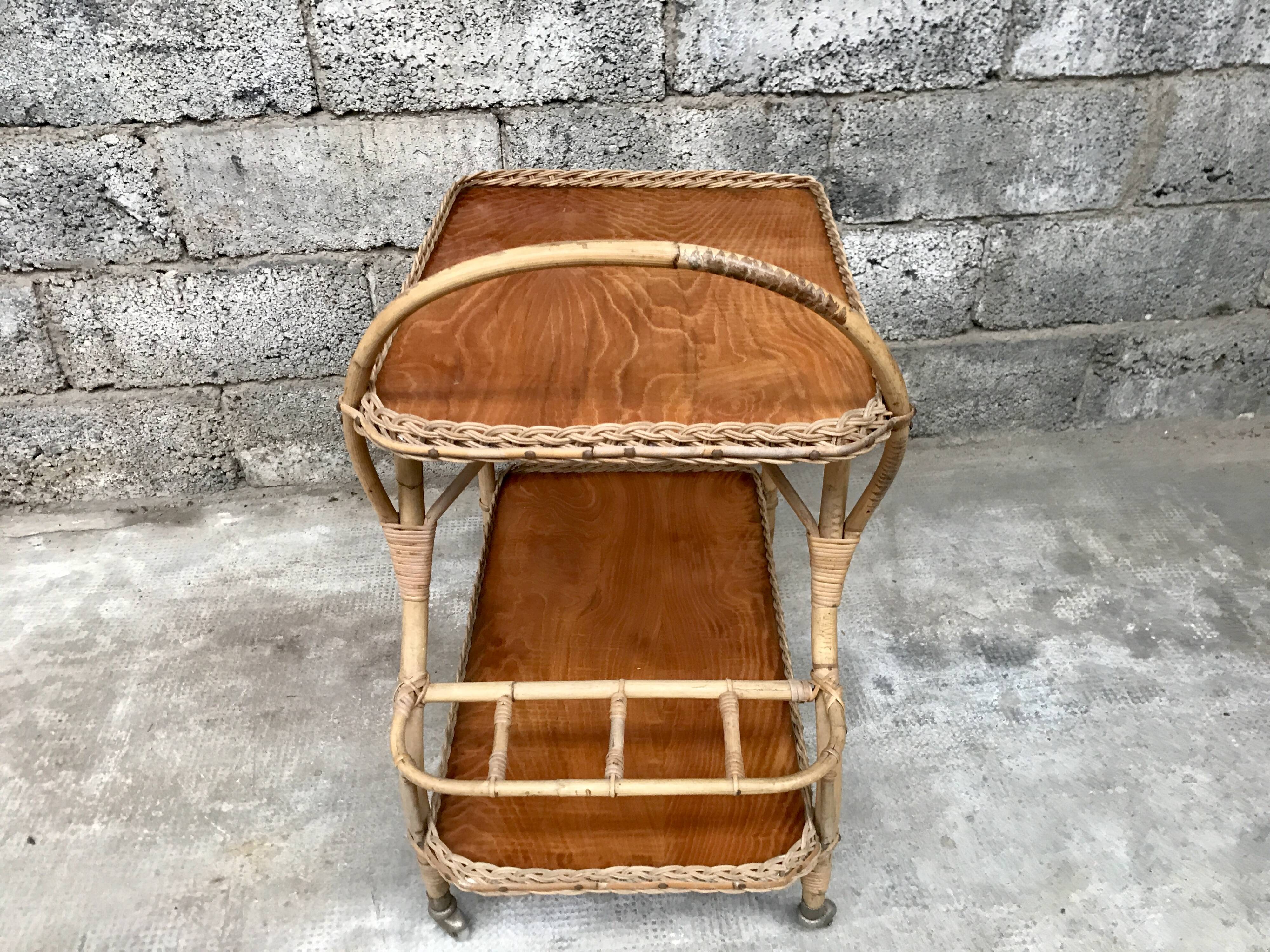 Rolling dessert in woven wicker bamboo rattan with 1950 bottle holder