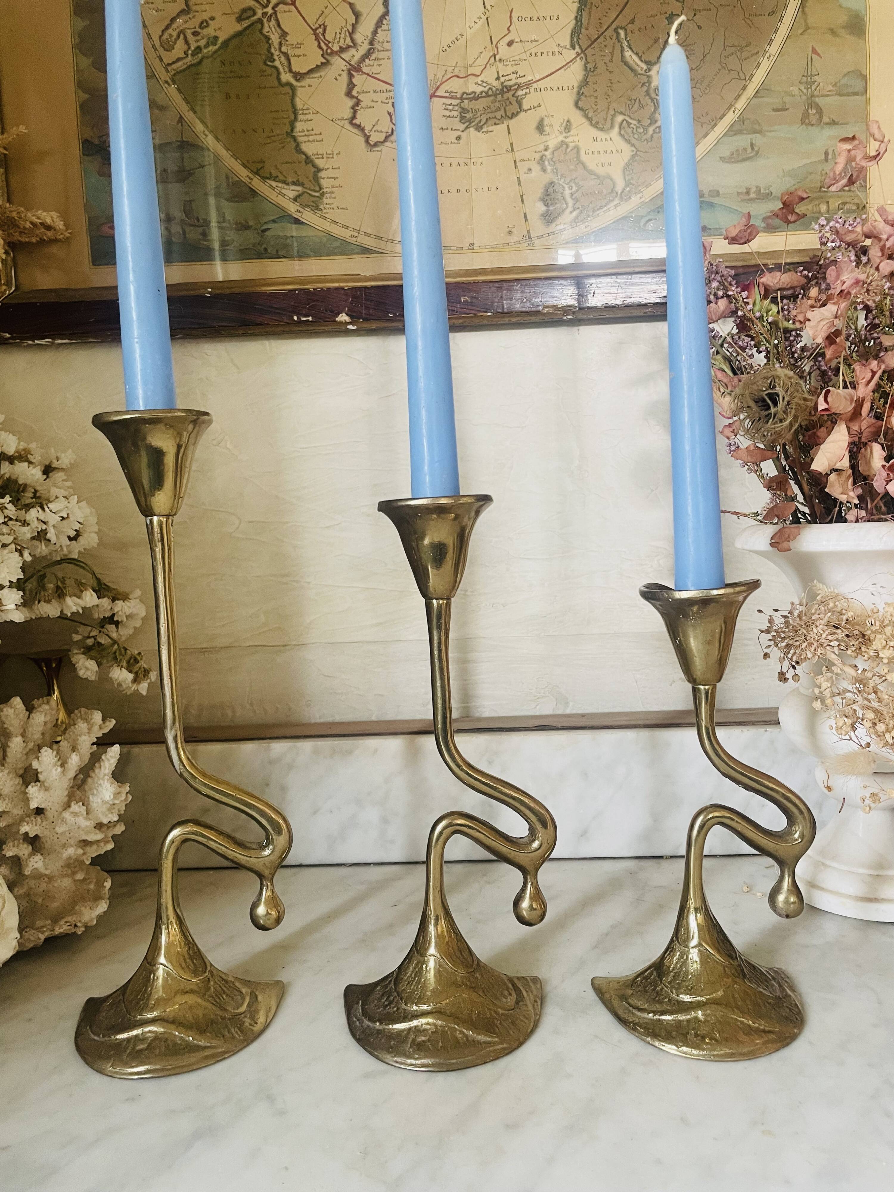 Art Nouveau style brass candlestick trio