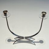 Silver-plated metal and plexiglass design candlestick.