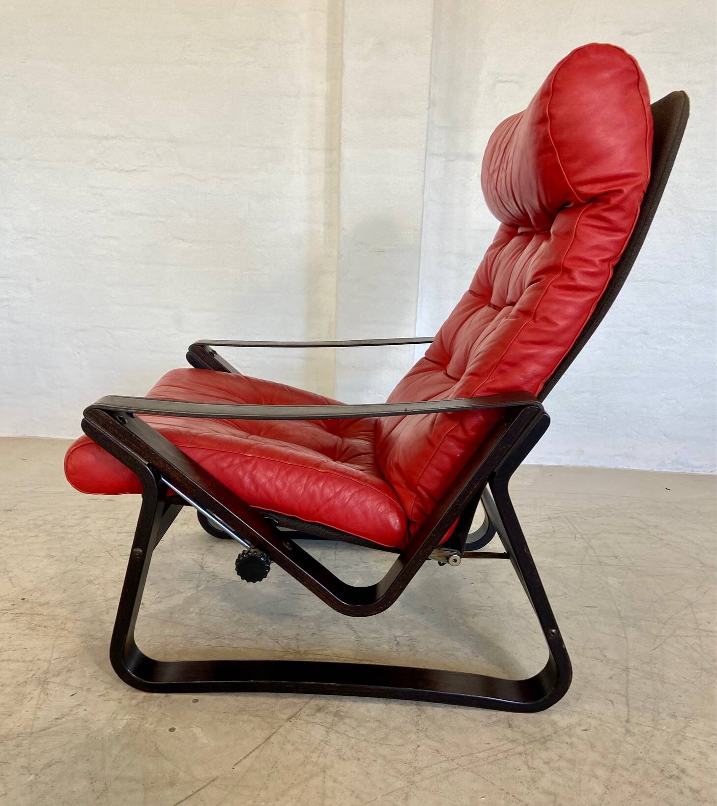 Vintage danish retro reclining lounge chair & stool in red leather by komfo