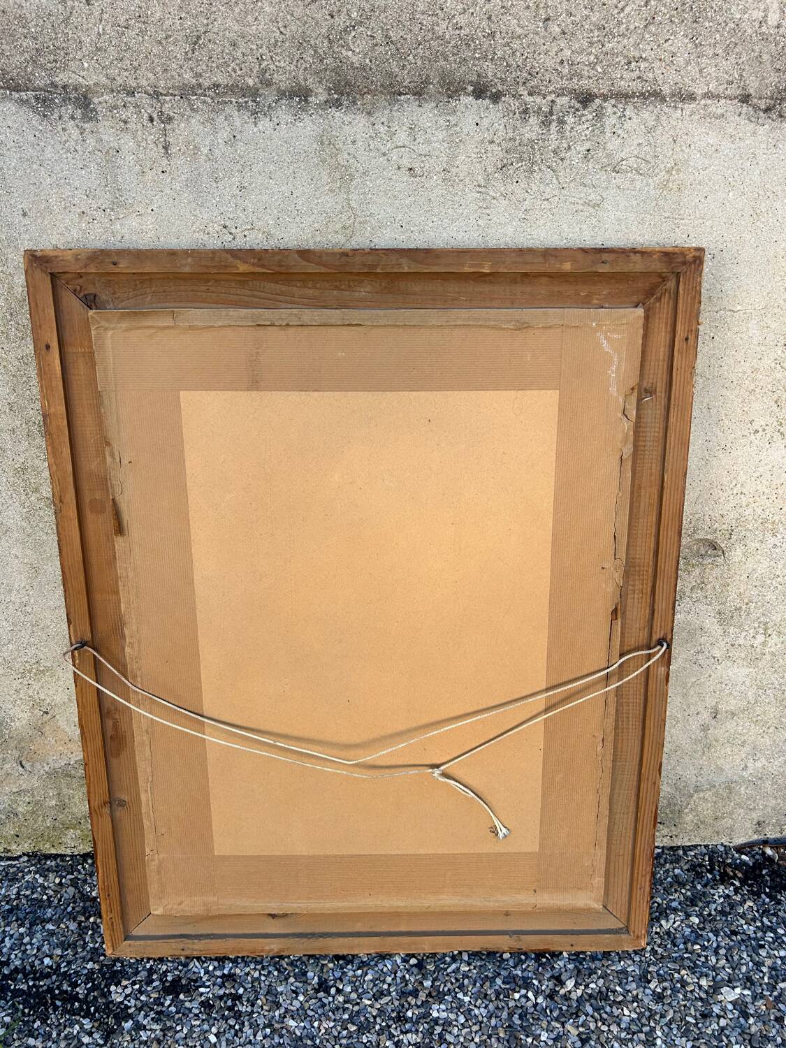 Antique mirror in patinated gilt wood