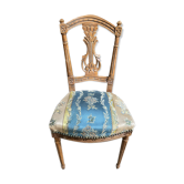 Antique chair in carved wood