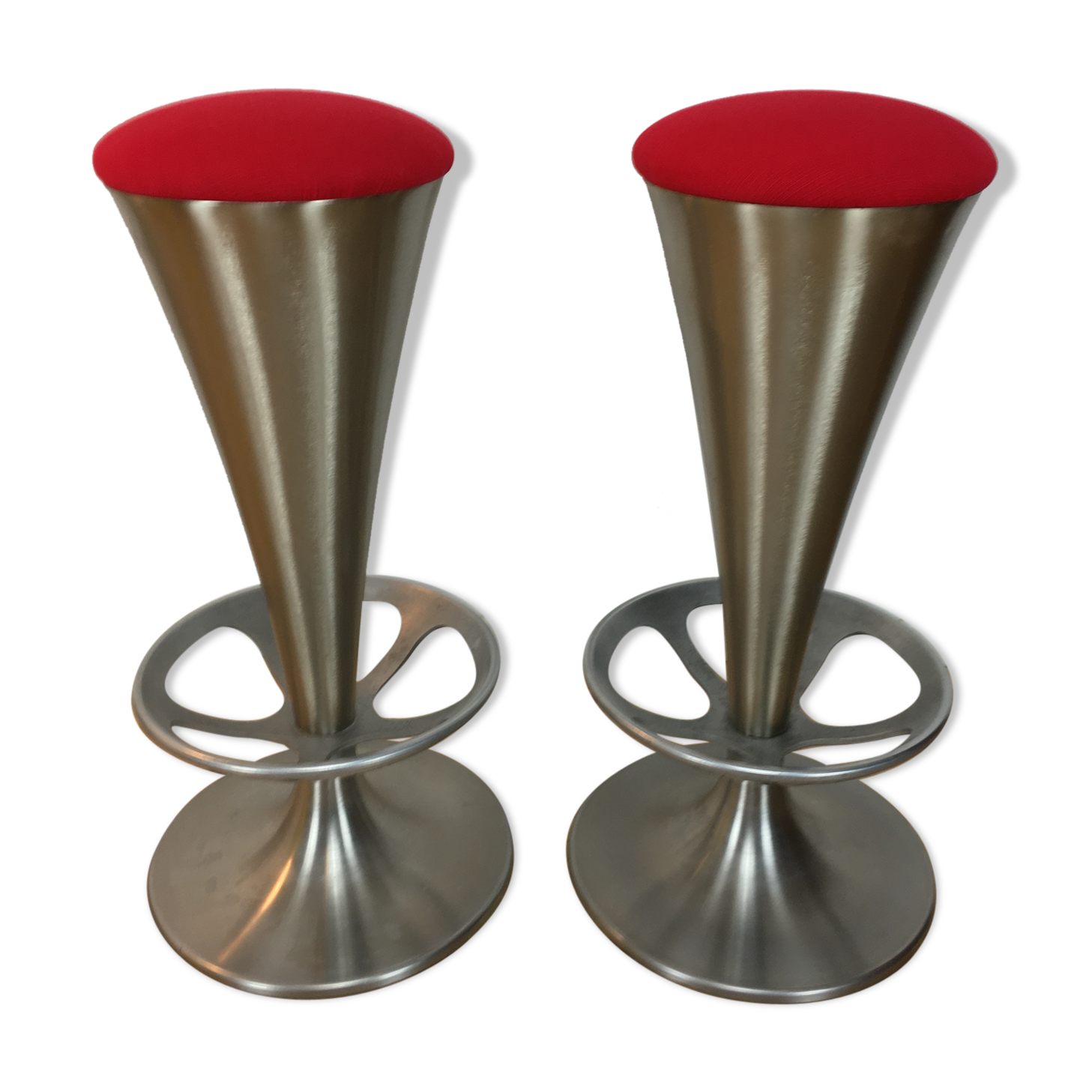Pair of 70's style metal bar stools in pop red