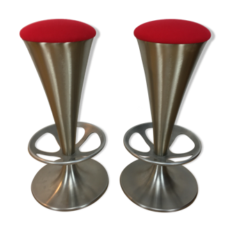 Pair of 70's style metal bar stools in pop red