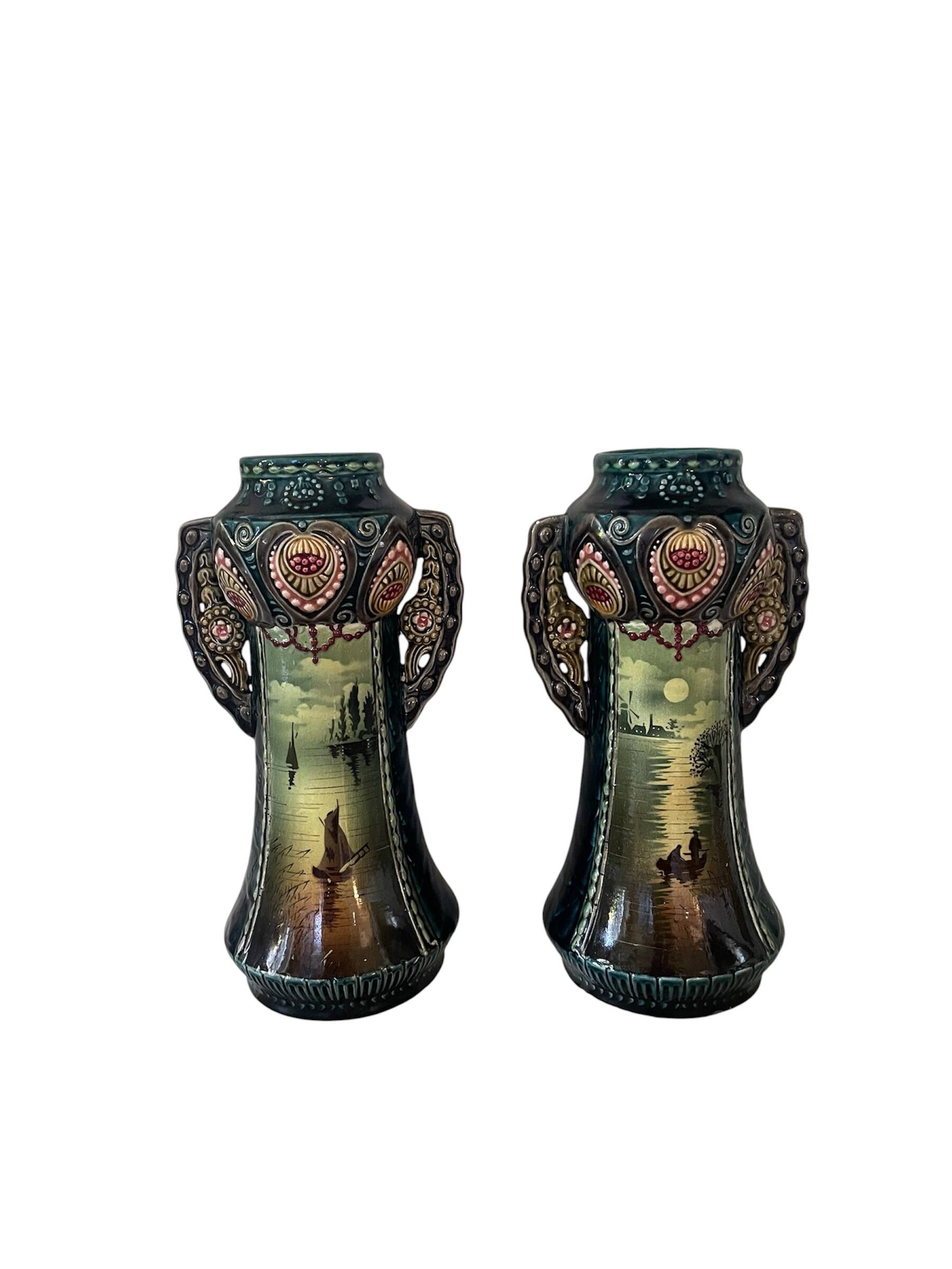 Pair of Art Nouveau slipware vases, hand-painted decoration.