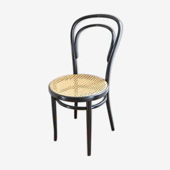 Curved wooden chair and canning