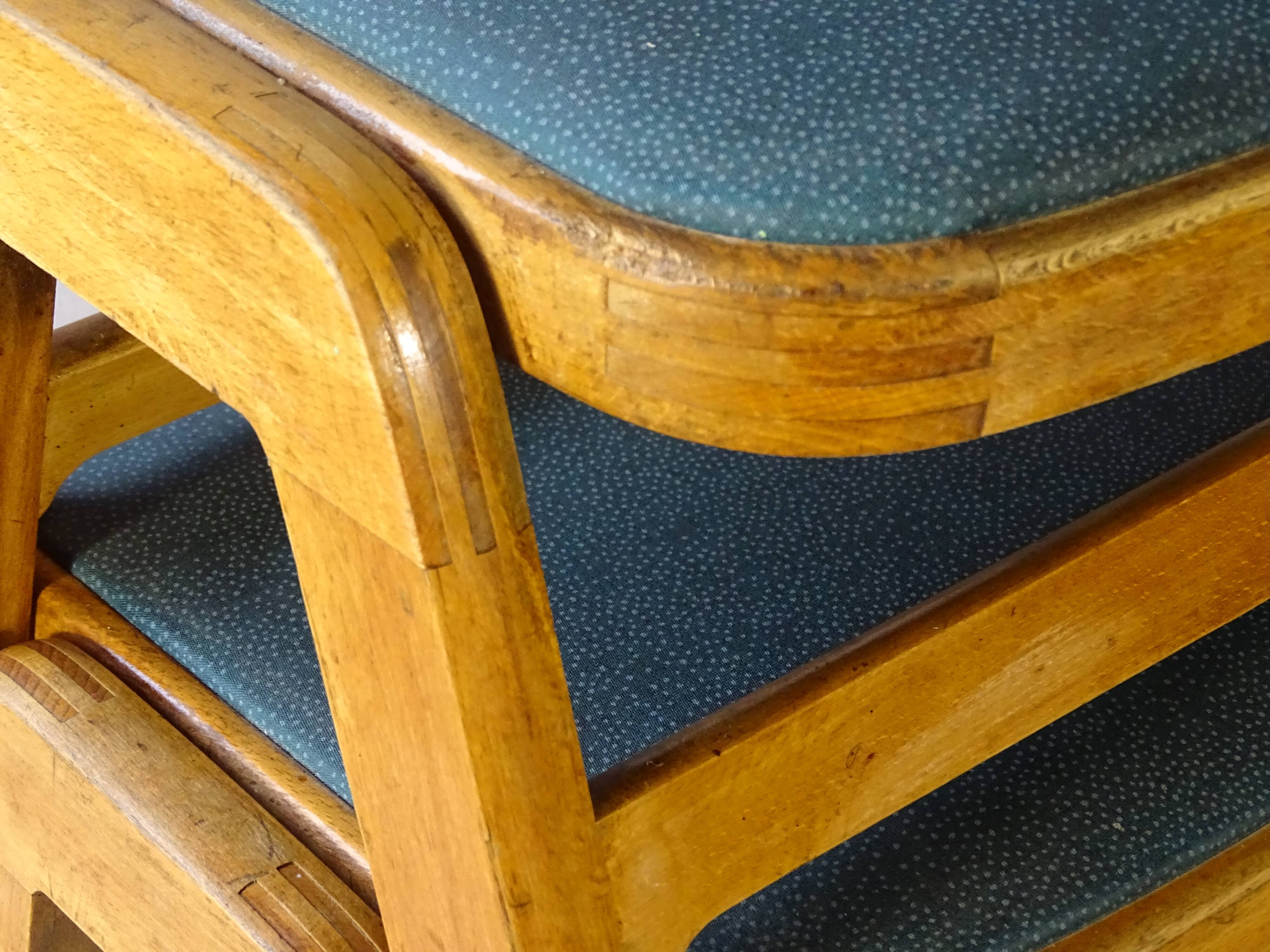 Two MID-Century green vinyl stools from the 1970s with tapered legs.