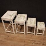 Four lacquered and painted living room coffee tables