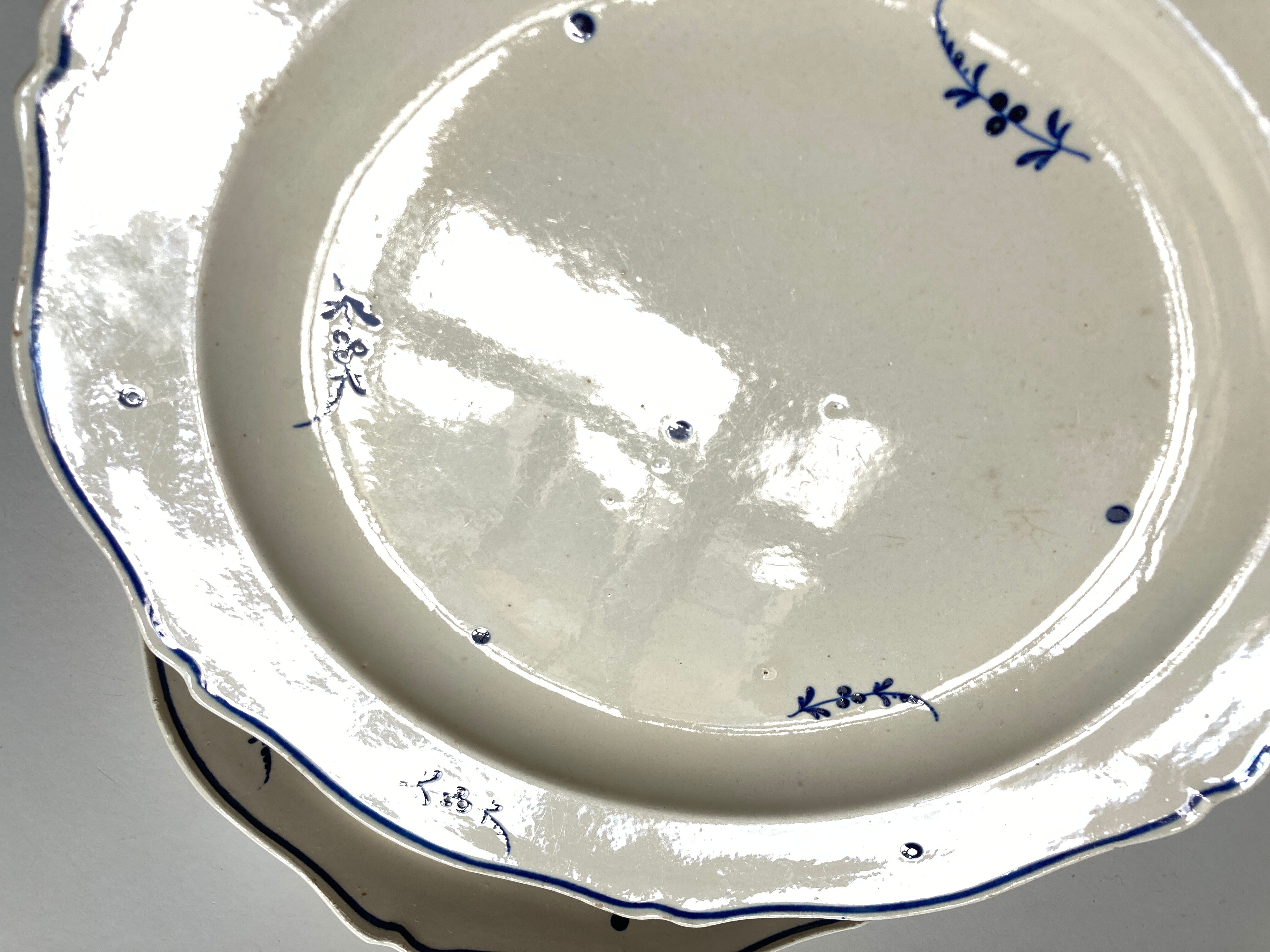 Set of 9 plates early 19th with faience twigs of Chantilly