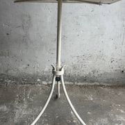 Mid-century pagoda bird cage on stand — white & black metal with brass accents