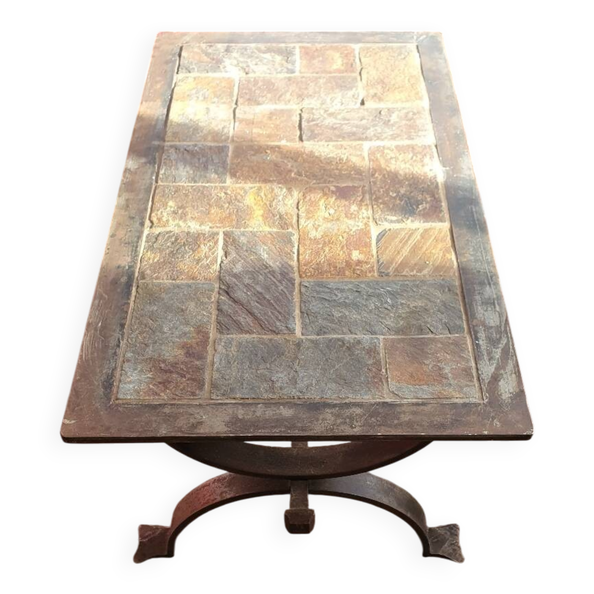 Blacksmith coffee table made of wrought iron and slate.