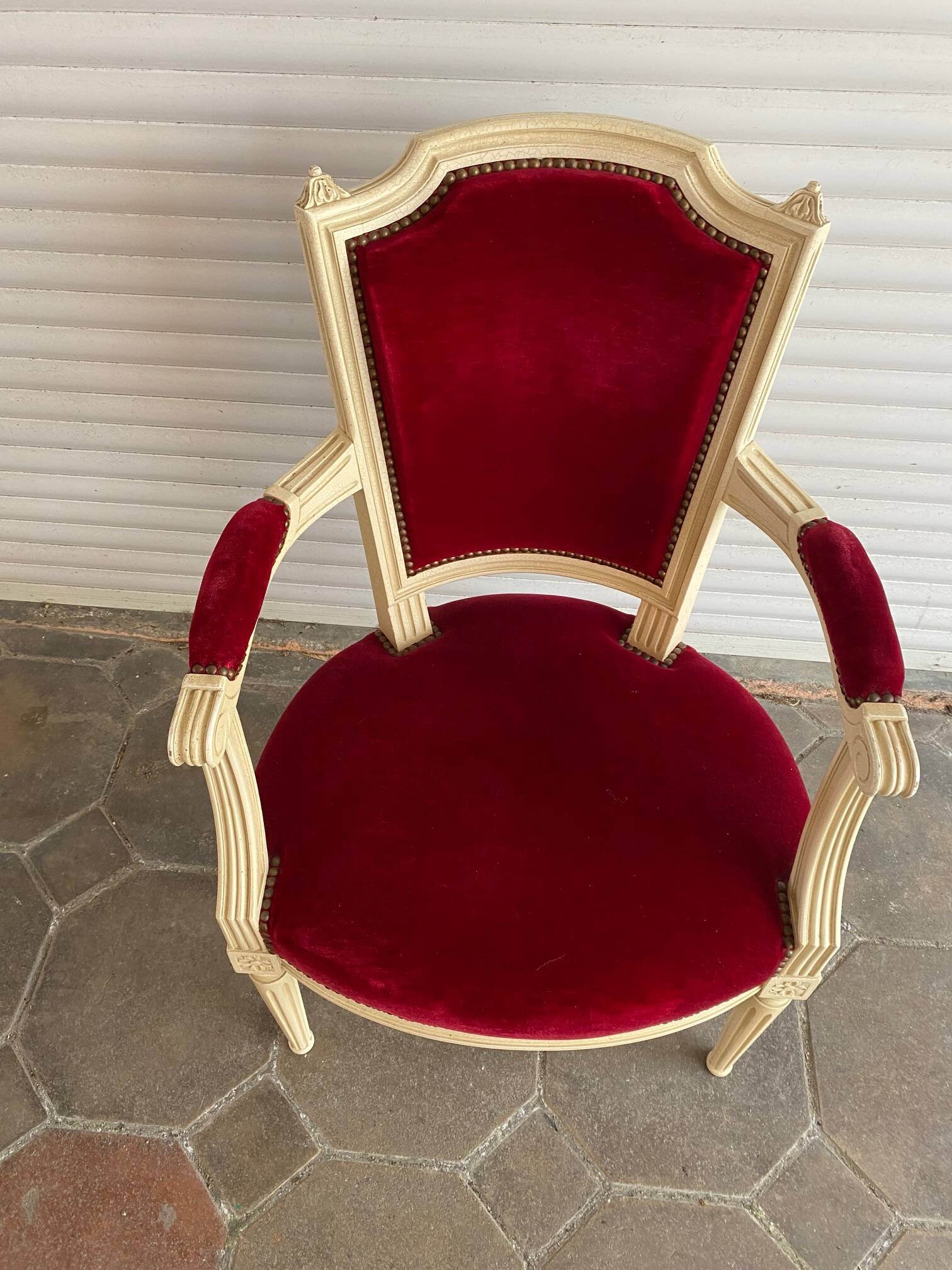 PAIR OF LOUIS XVI STYLE CABRIOLET ARMCHAIRS IN STUDDED RED VELVET FABRIC