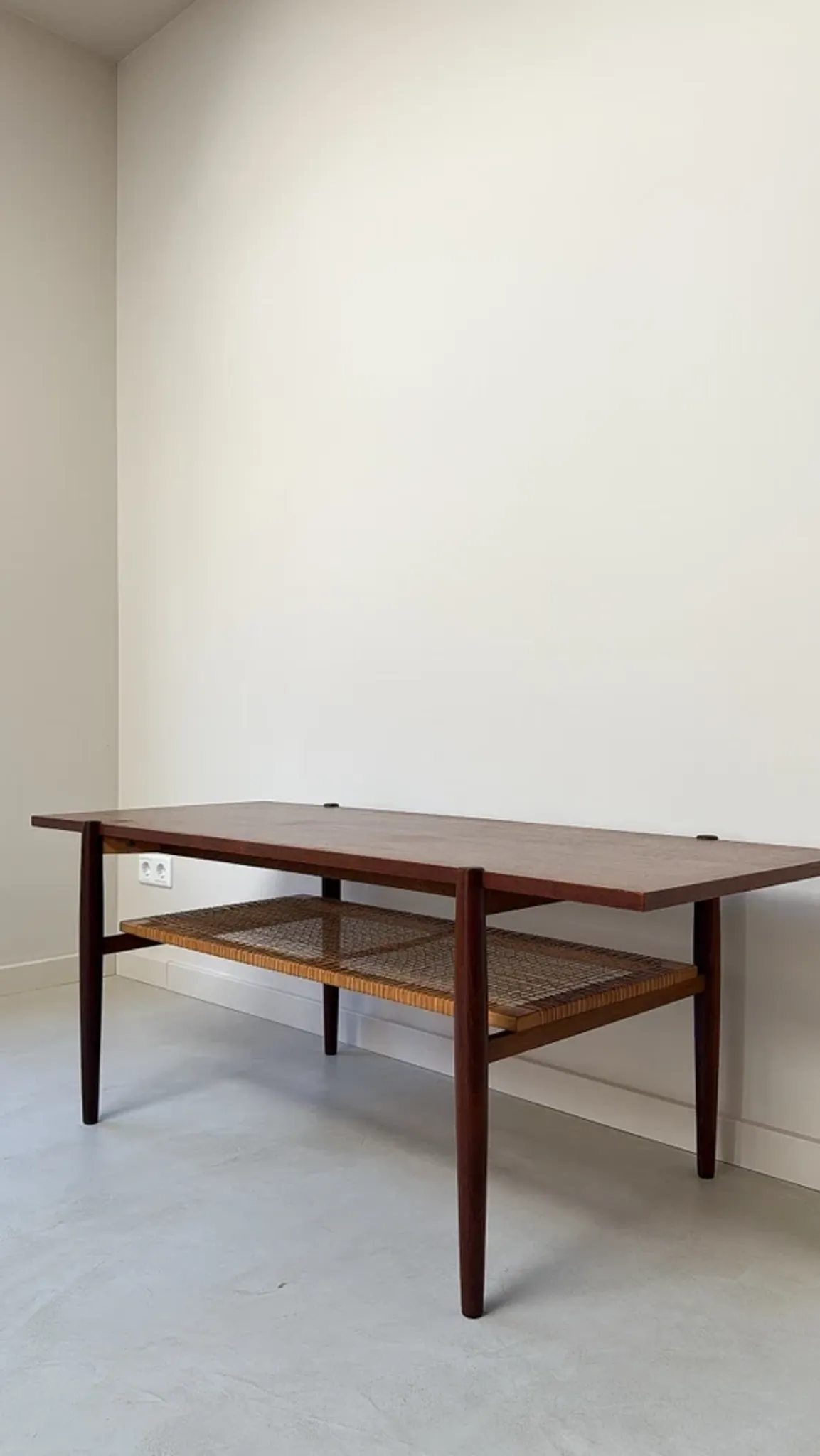 Vintage wooden coffee table with wicker lower shelf