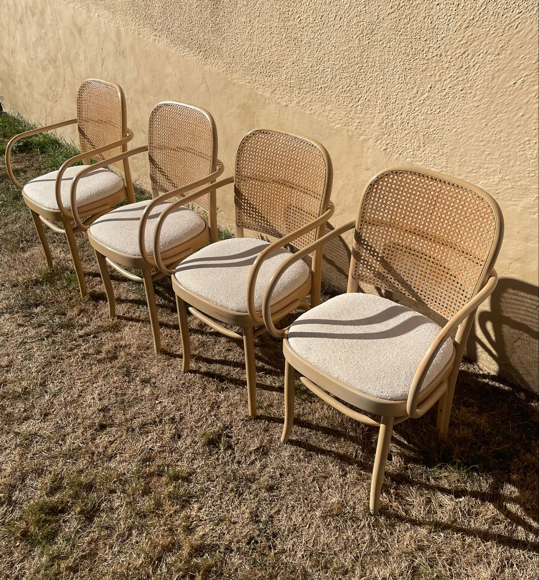 4 curved wooden dining chairs