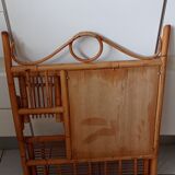 Old bamboo and rattan mirror with vintage folding shelves