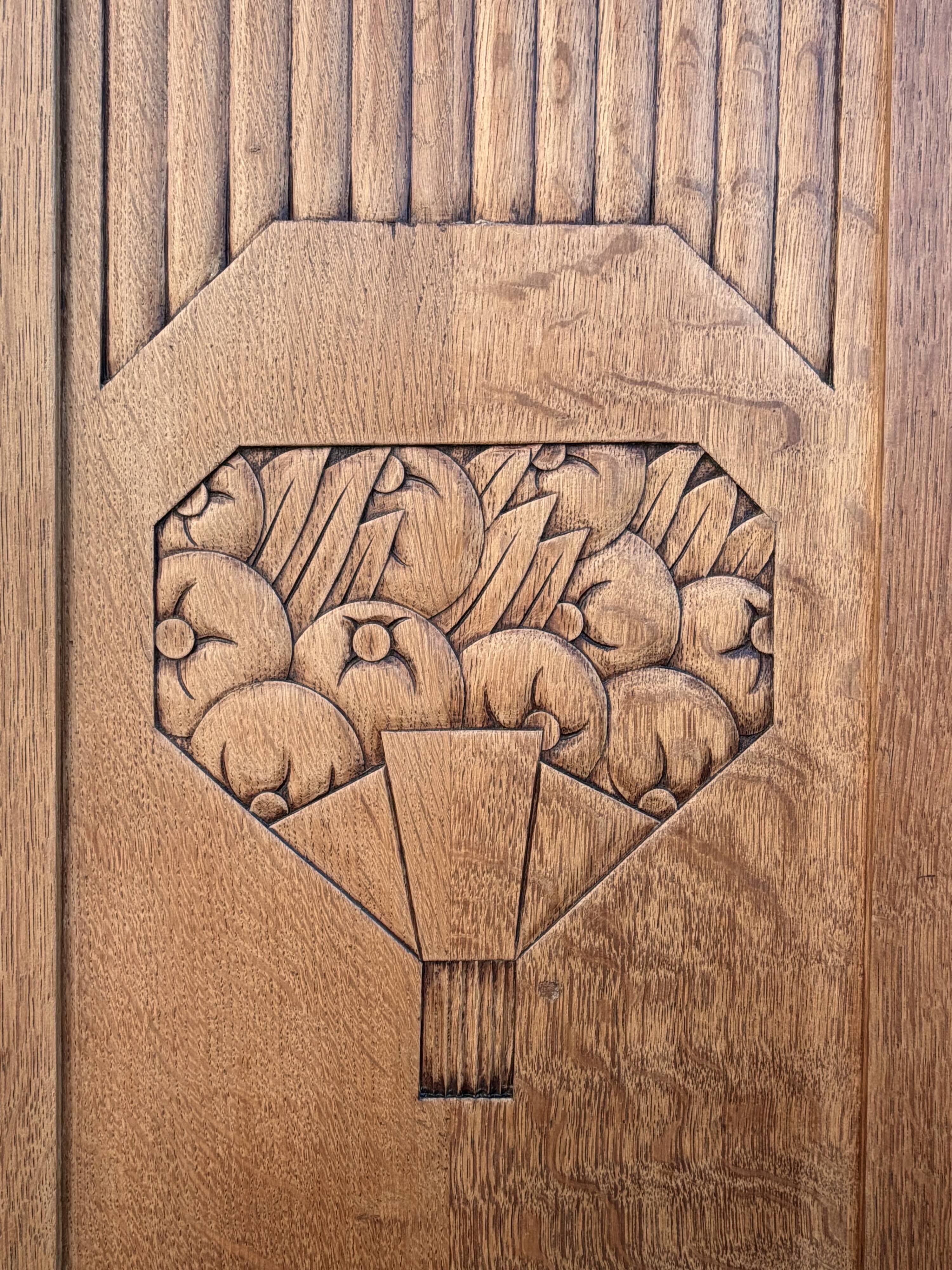 Art deco wardrobe in raw oak with bevelled mirror.