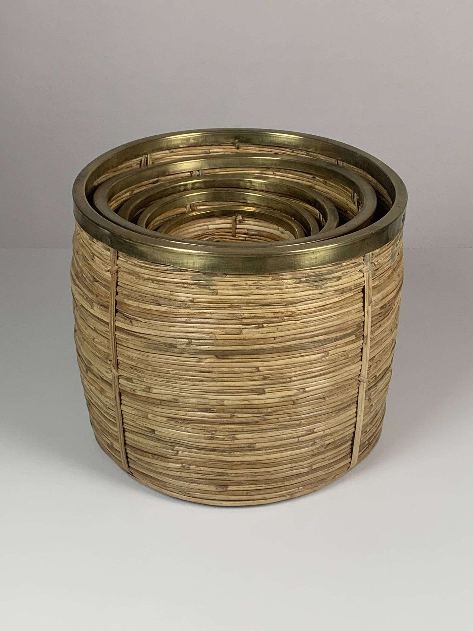 Set of 5 rattan pencil reed and brass plant holder baskets, Italy 1970s