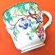 Antique porcelain cup in the Minton style with Japanese decoration.