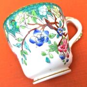Antique porcelain cup in the Minton style with Japanese decoration.