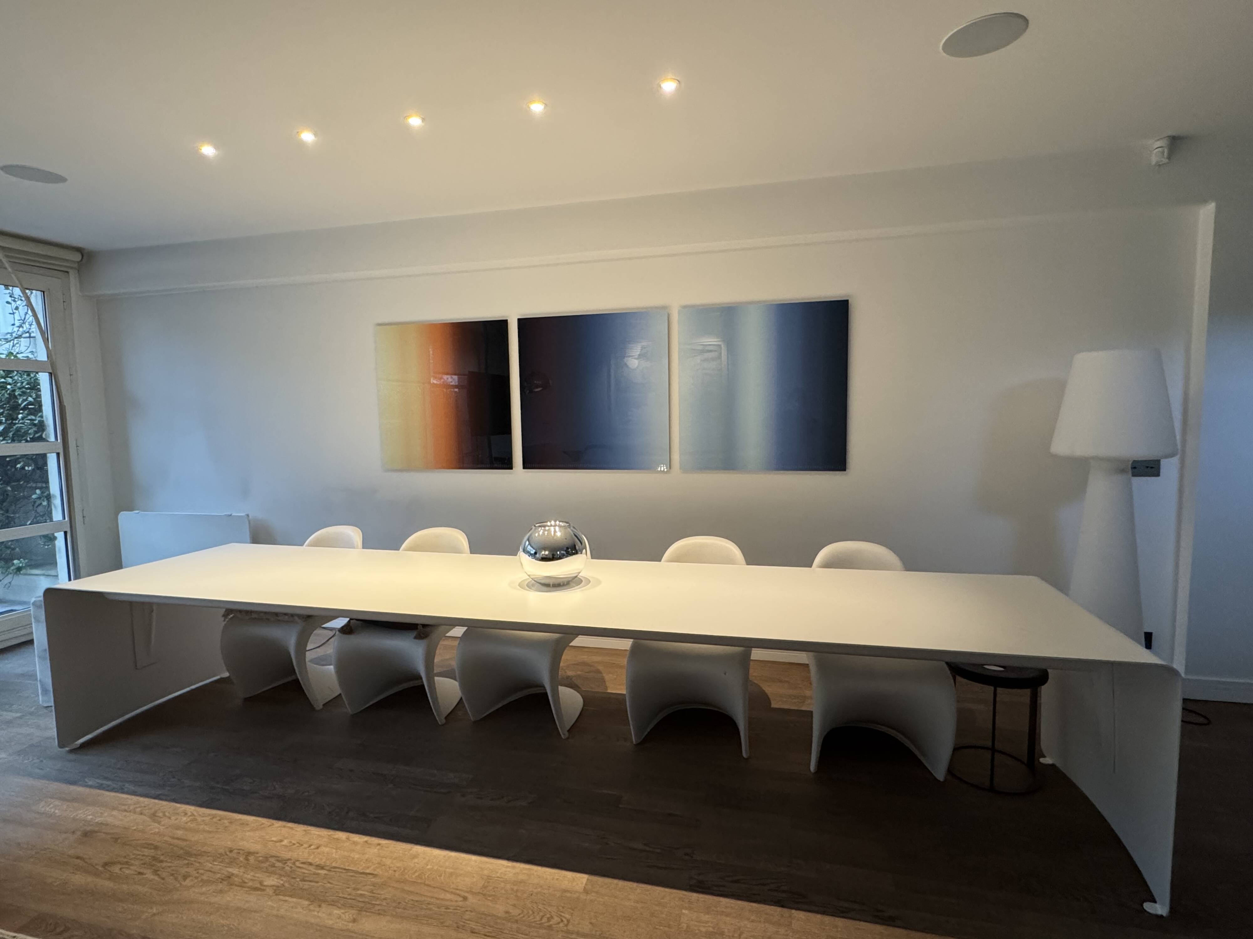 Large curved aluminium tabletop.