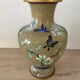 Chinese cloisonné vase decorated with flowers and butterflies.