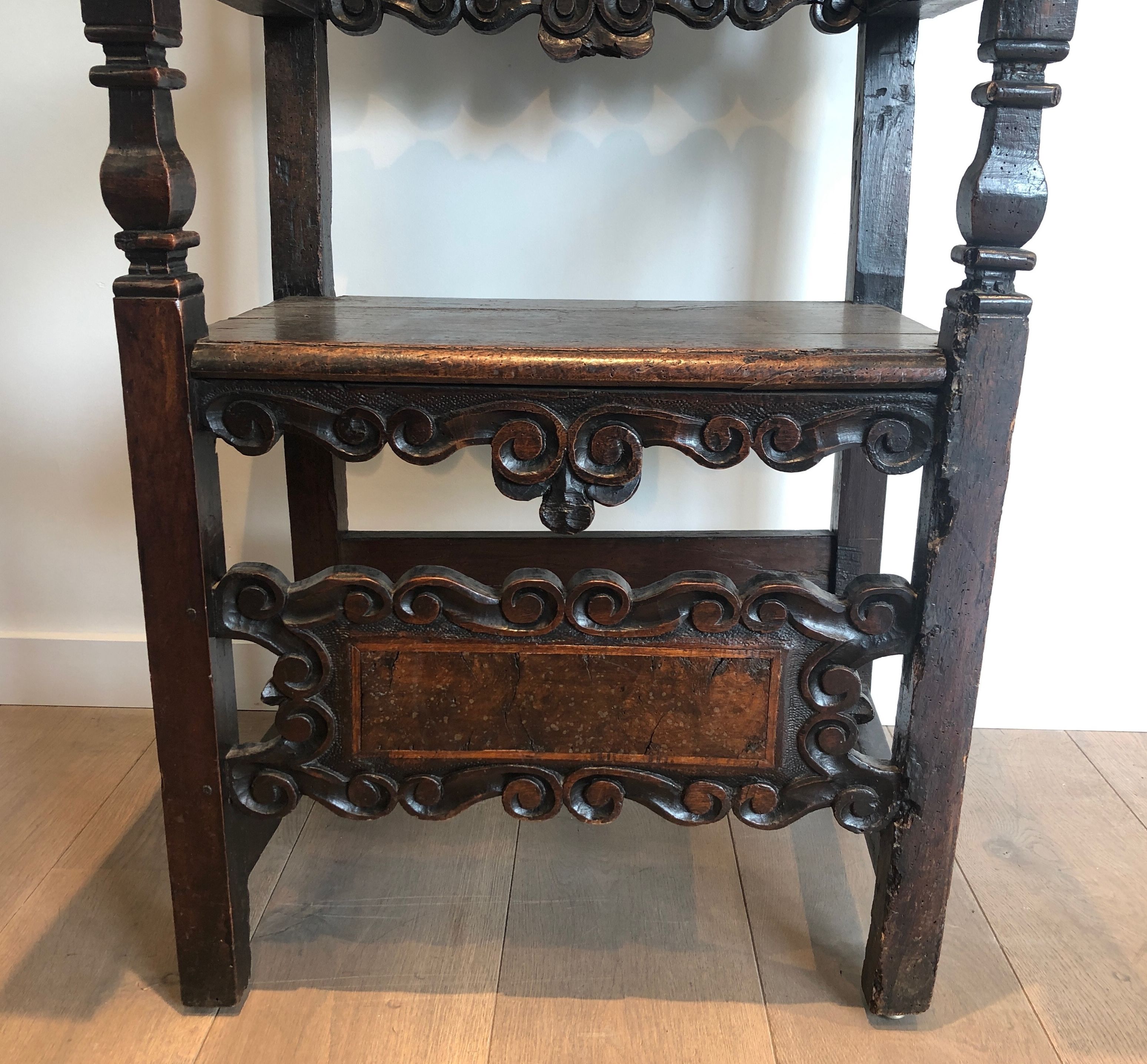 Set of an armchair and a pair of chairs in Italian Renaissance walnut