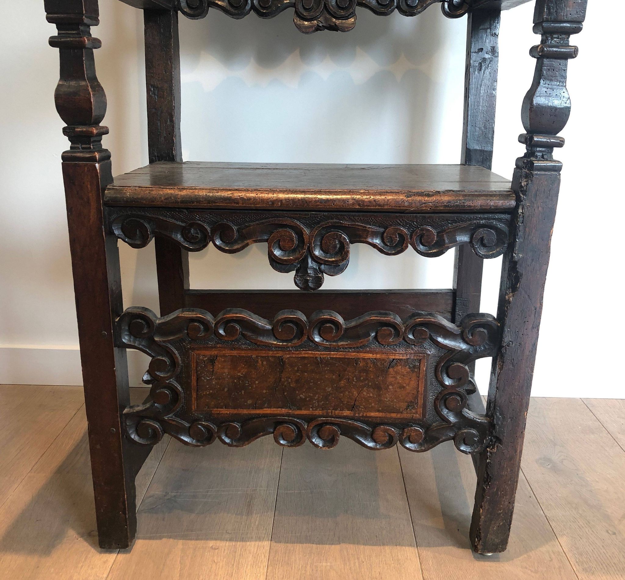 Set of an armchair and a pair of chairs in Italian Renaissance walnut