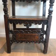 Set of an armchair and a pair of chairs in Italian Renaissance walnut