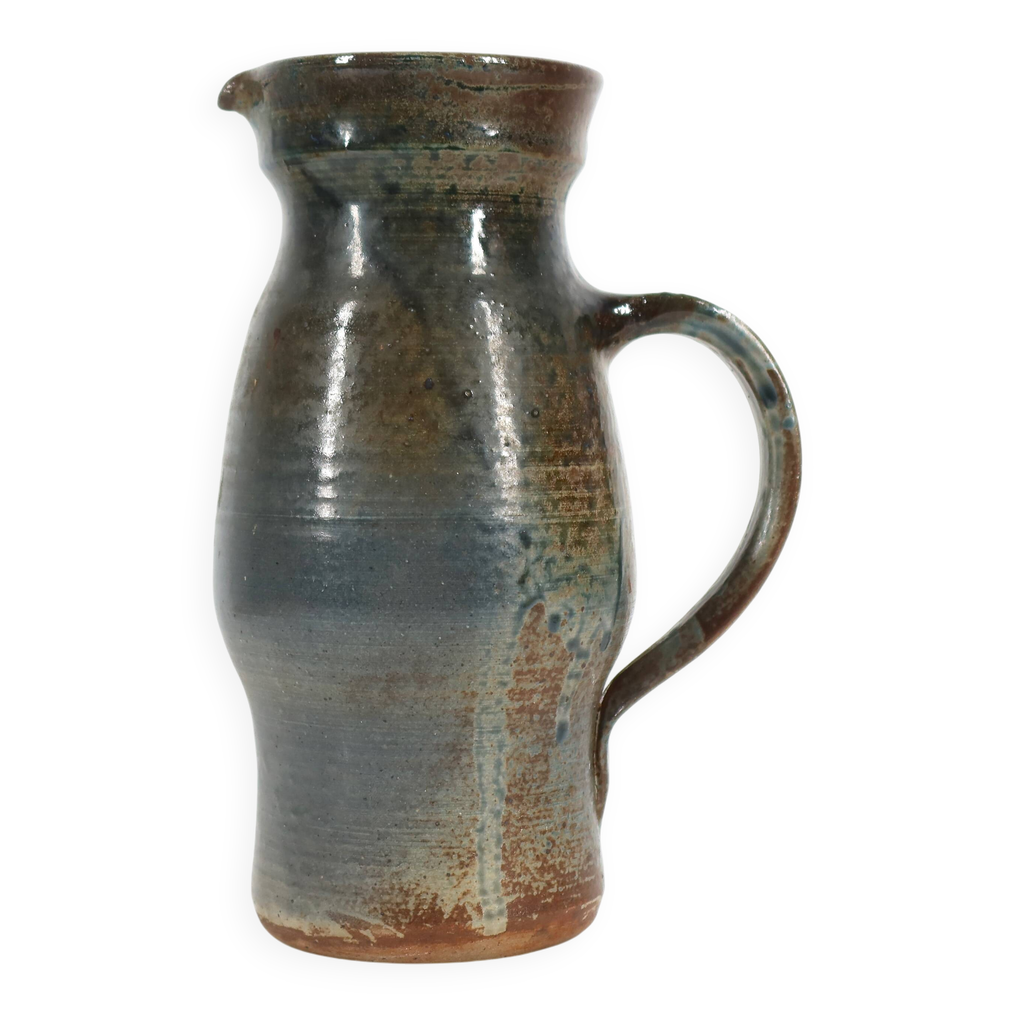 Handcrafted stoneware pitcher with blue-green hues, signed piece