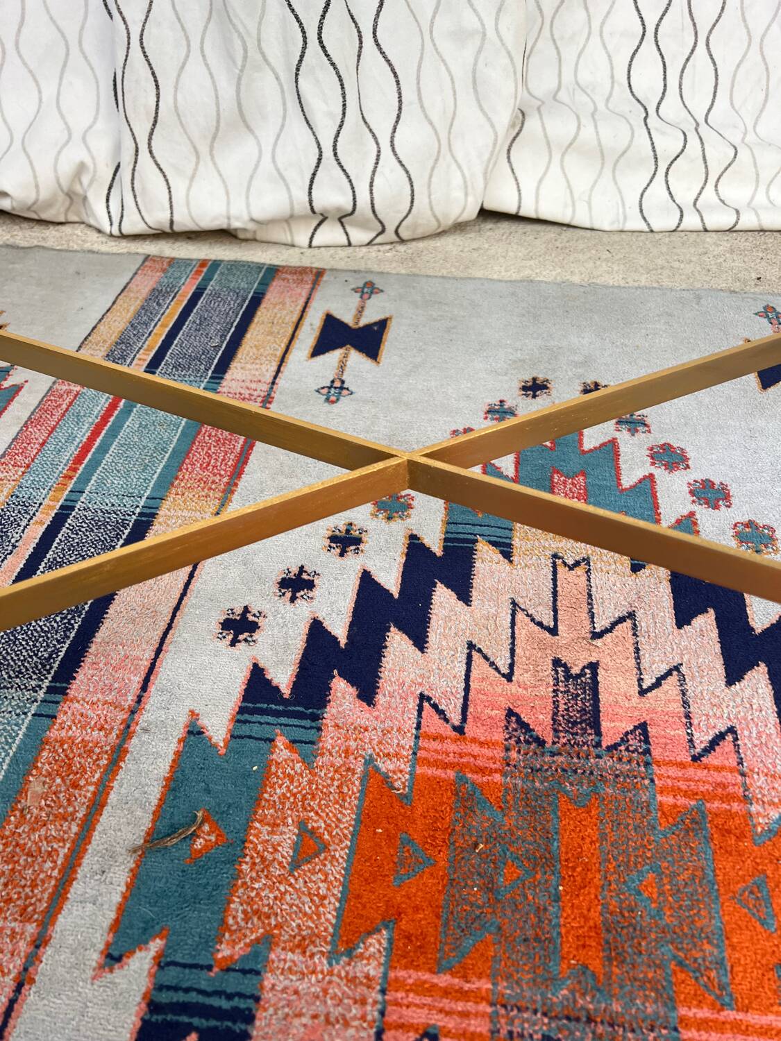 Vintage gold coffee table. Glass top.