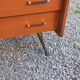 Vintage mahogany commode with metal tapered legs, 4 drawers, 1950s.