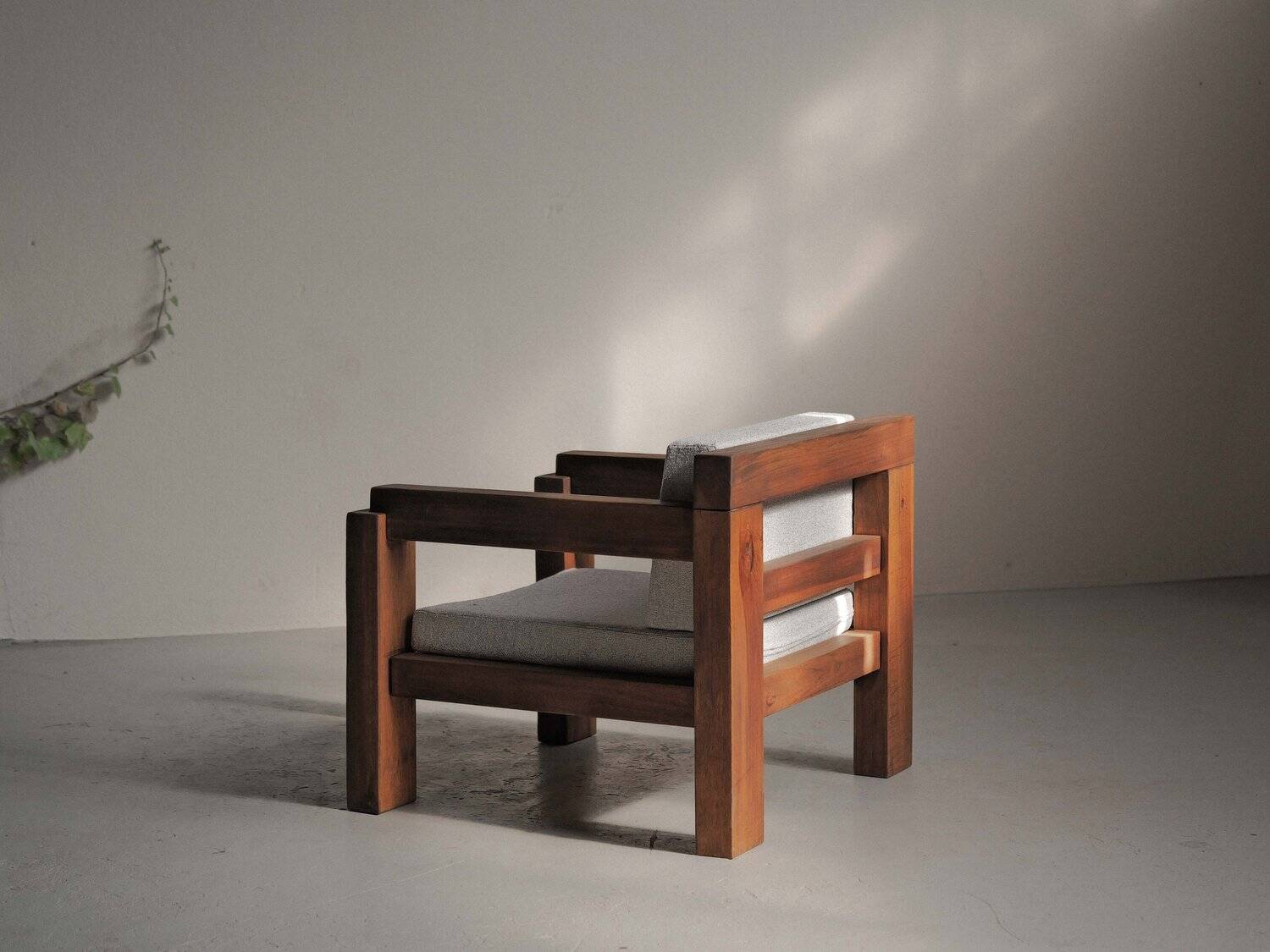 Handcrafted armchair in solid wood and fabric, 1980s-90s.