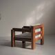 Handcrafted armchair in solid wood and fabric, 1980s-90s.