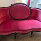 Moulded and carved wooden canapé, Napoleon III period.