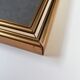 Photo frame under glass, gilded wood