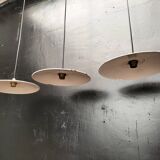 Three enamelled sheet metal suspensions