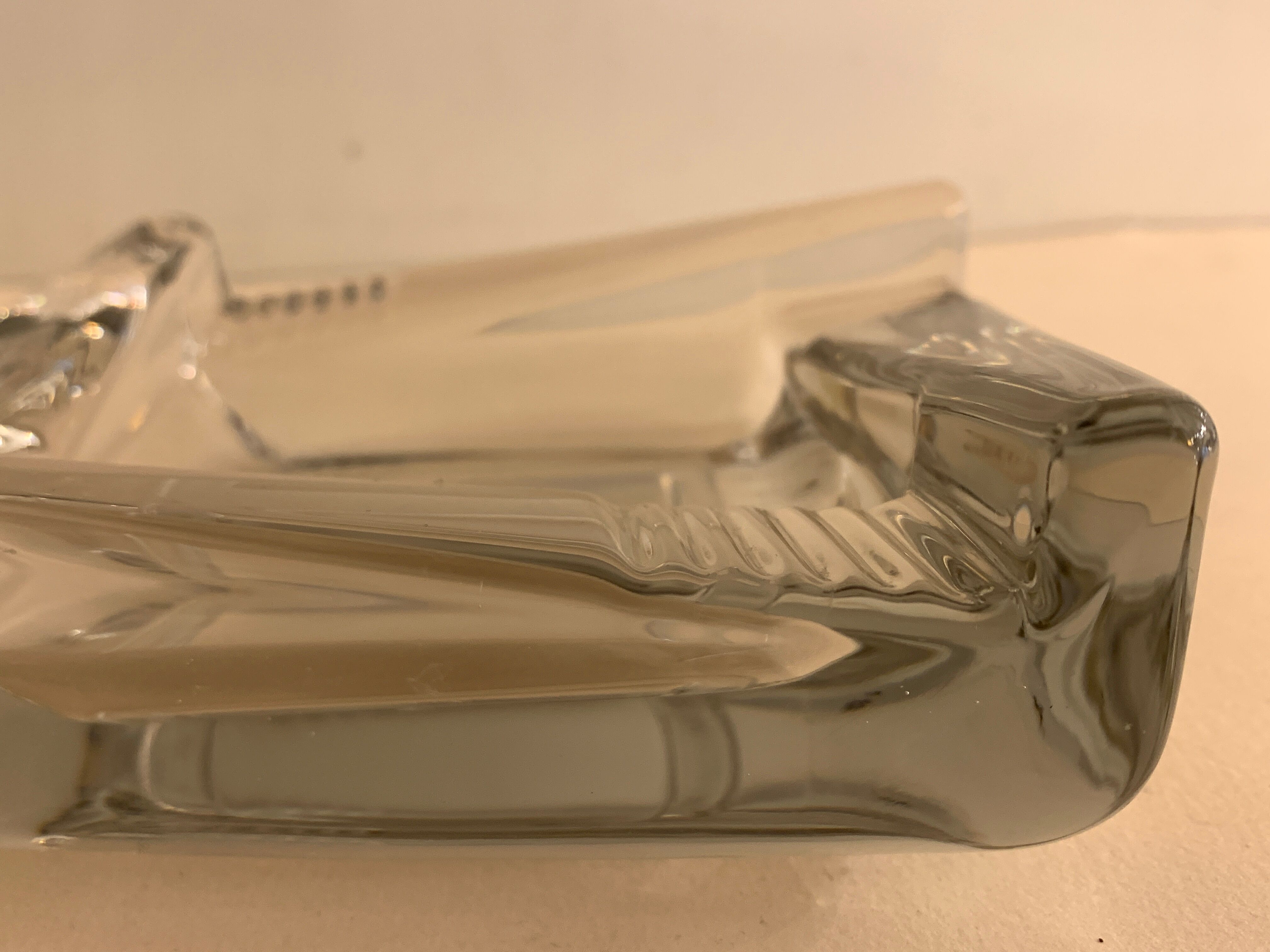 Transparent moulded glass ashtray