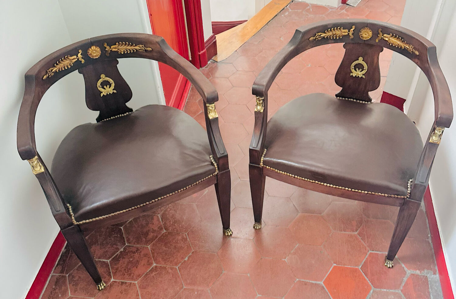 Pair of Empire armchairs in bronze and mahogany.